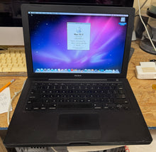 Apple MacBook 13-inch Black April 2008 2.4GHz Intel Core 2 Duo (MB404LL/A)